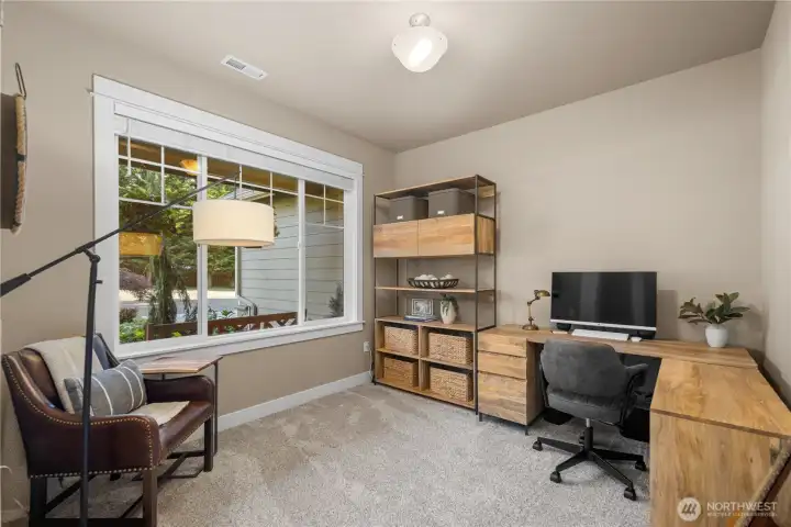 Main floor office/den off entry.