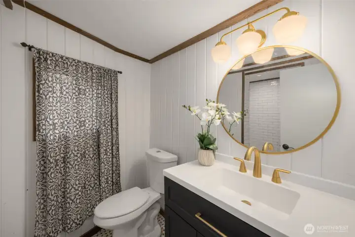 bathroom with new vanity and fixtures