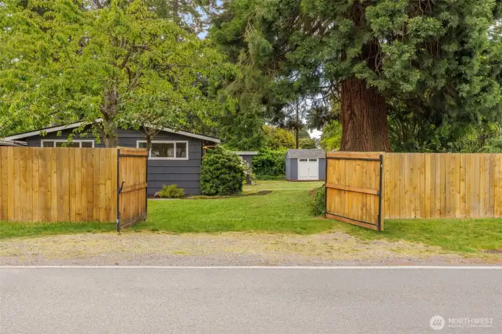large gate at the side can be opened to access the yard, park a boat, RV, or ???