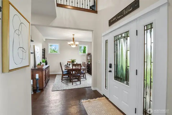 Front entry features formal dining on one side and an office on the other. Front entry features formal dining on one side and an office on the other.