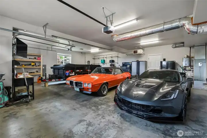 Oversized 3 car garage is finished, heated and features 220V and a Gentran hookup. Oversized 3 car garage is finished, heated and features 220V and a Gentran hookup.