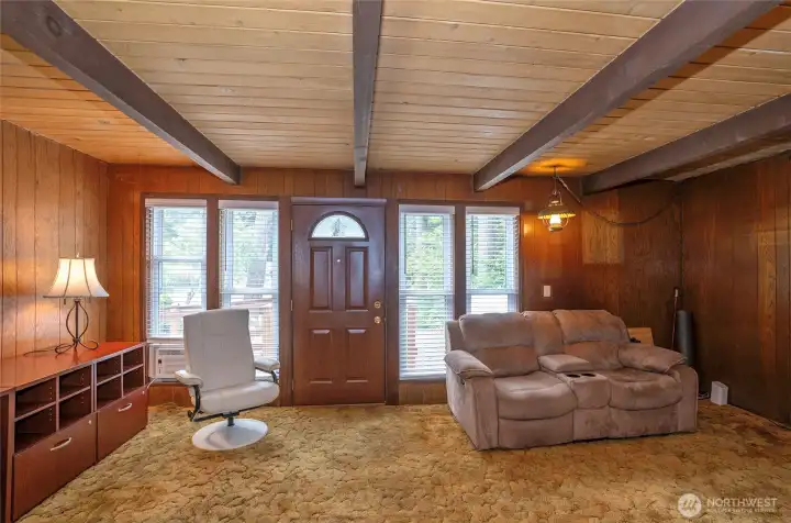 Original home featuring beautiful tongue-and-groove ceilings in the living area, adding warmth, charm, and timeless character. Original home featuring beautiful tongue-and-groove ceilings in the living area, adding warmth, charm, and timeless character.
