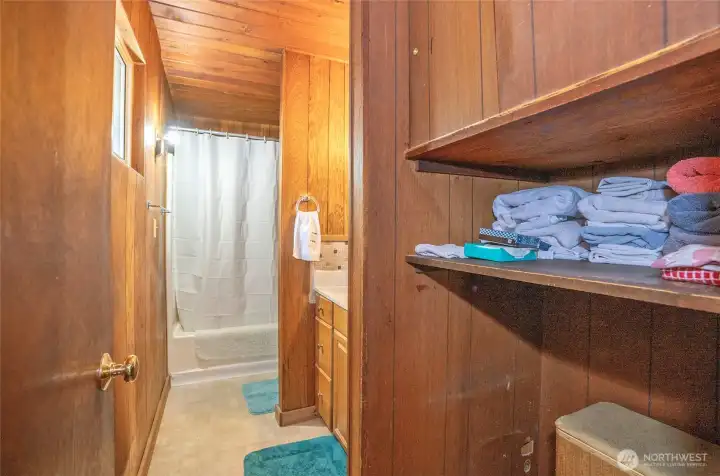 Main floor full bathroom offering added storage. Main floor full bathroom offering added storage.