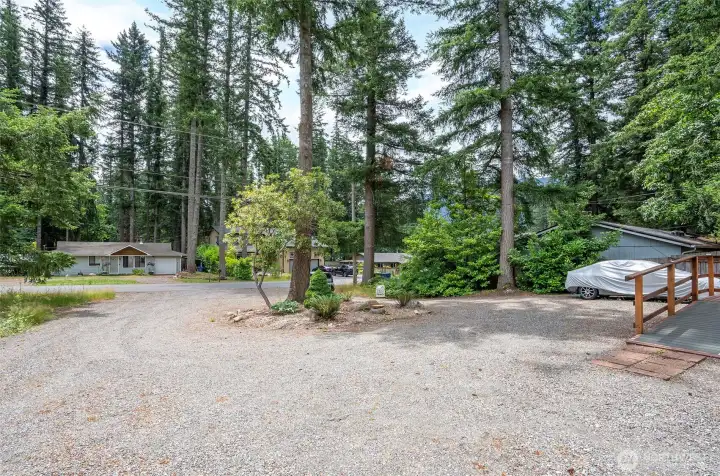 Convenient circular driveway providing easy access and plenty of parking for vehicles, guests, and recreational toys. Convenient circular driveway providing easy access and plenty of parking for vehicles, guests, and recreational toys.