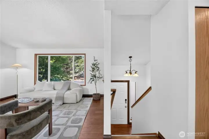 Looking down at the entrance to the home from the living area.