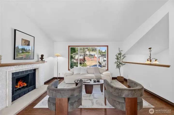 View of living room....the vaulted ceiling makes this area feel open and airy, yet so comfortable.