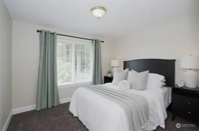 Charming guest suite located on the upper level.