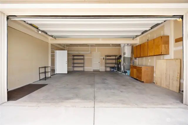 Double garage bay with built in work bench