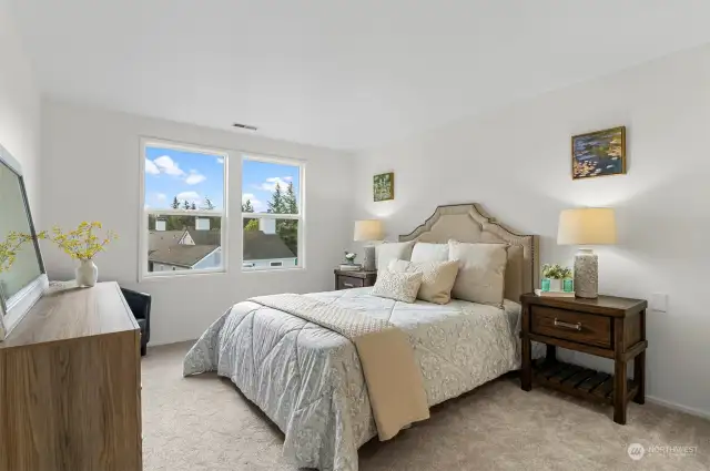 Spacious Primary Bedroom - Large Window to bring in lots of light.