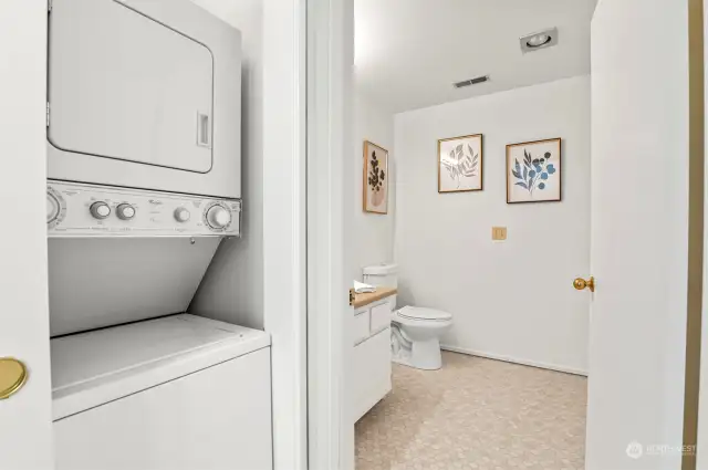 Washer Dryer in Closet next to Half Bath.