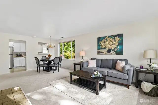 Spacious Living Area. Second floor Corner Unit allows for natural light to flow through the Windows.