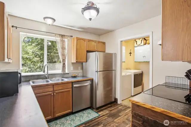 Kitchen 5. View into the laundry room when door is open.