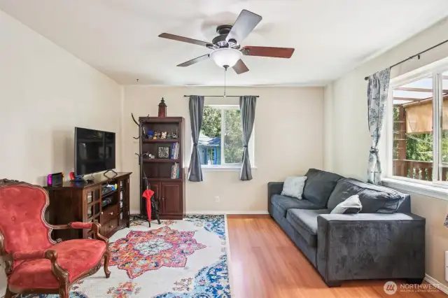 Living room with Ceiling fan.
