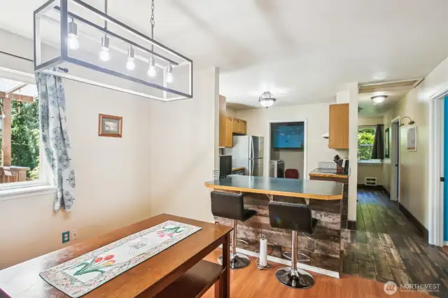 Dining area & bkfst bar for casual eating.