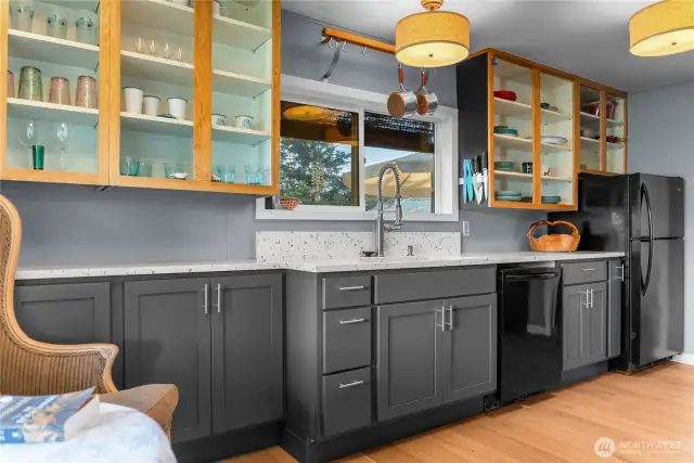 You'll love the cabinets soft-close hardware and sleek design.
