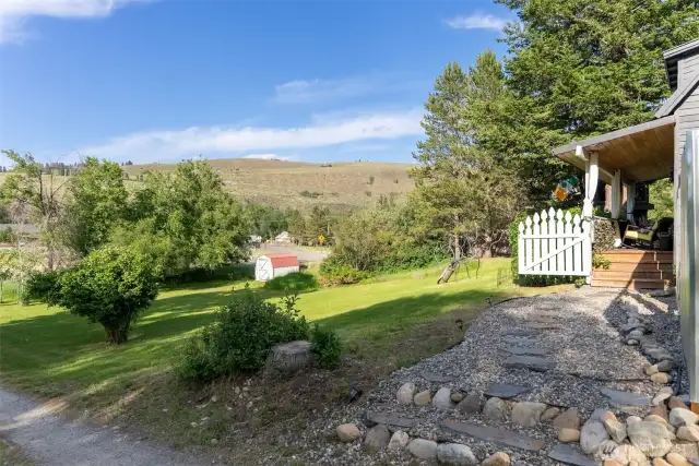 Only yards to Methow trails, Winthrop libaray, Winthrop skating rink, and downtown Winthrop. Sunny front yard with lovely views has so many  options.
