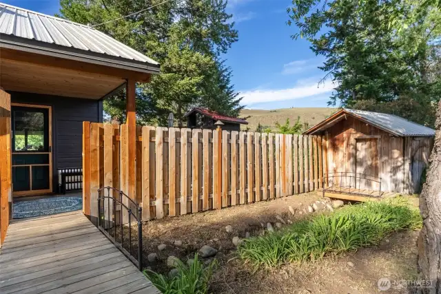 Open to light & garden views behind privacy fence