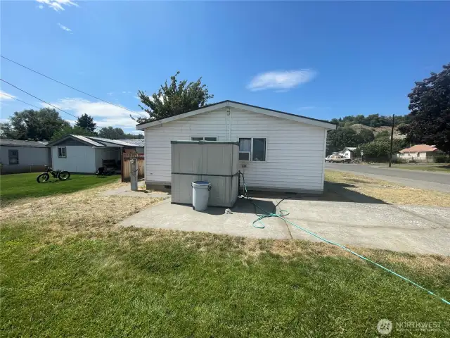 Parking off street driveway with 4x6 shed.