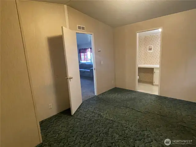 Primary bedroom off the living room area.