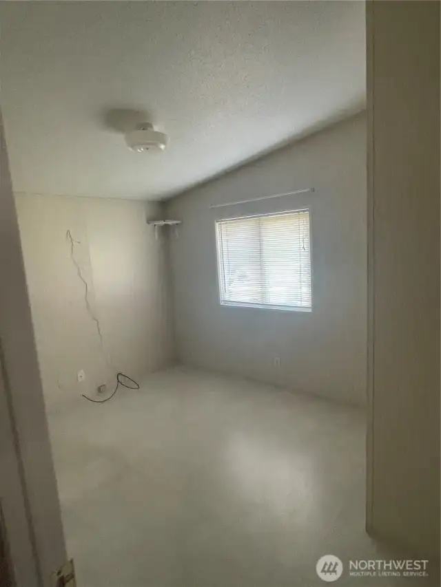One of the two bedrooms which are side by side bedrooms with a full bathroom to use.