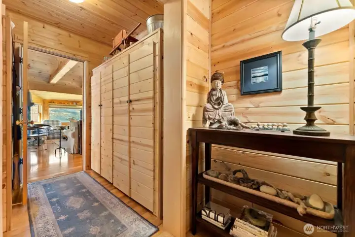 Foyer to hallway and great room main level of home. Leads to Kitchen and dining room.