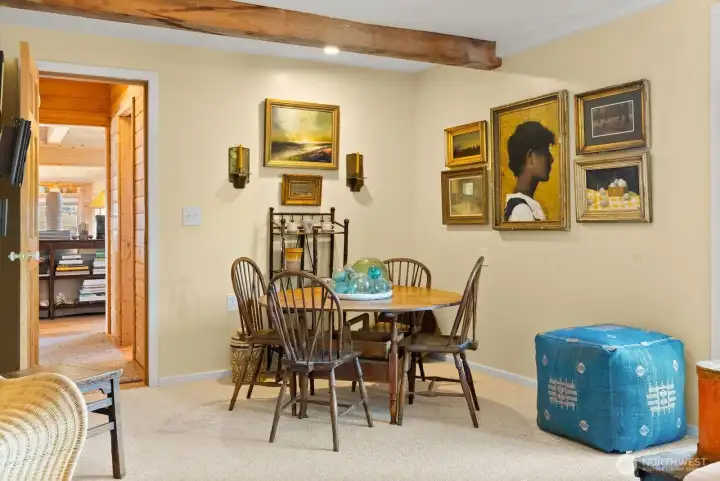 Round table is good for lunch and games alike. Full bath off hallway between Sun room and great room.