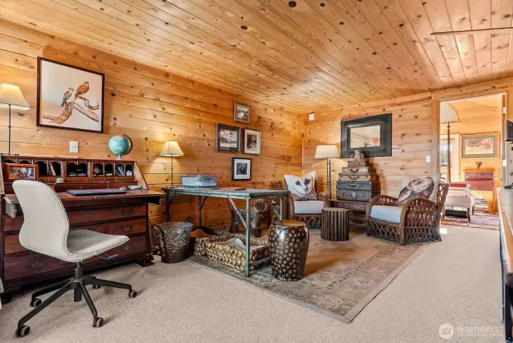 Loft Office and den nestled next to the primary bedroom. Balcony & stairs to North deck from this room.
