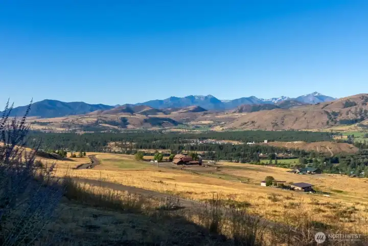 S.W. view of the Sawtooth Mountain range in distance. Patterson Mtn and Lakes in the foothills.