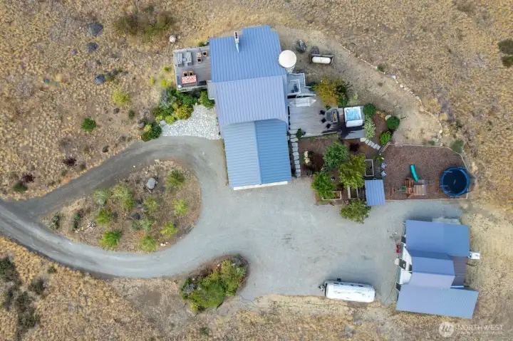 Overview 8 Deer Trails Way driveway large parking area Home, double large Garage, Barn and shop North and South decks.