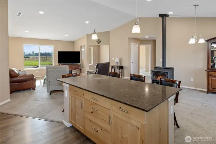 View from Kitchen into living space & dining area.