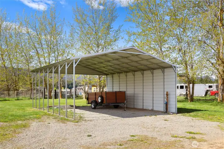 Carport with full RV hookups!