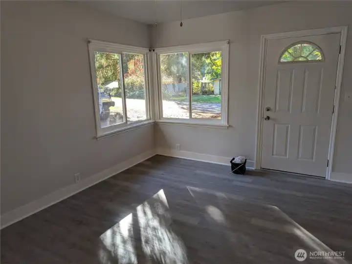 Living room with front entrance door