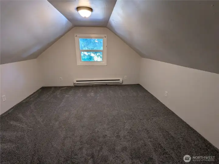 Upstairs bonus room with closet