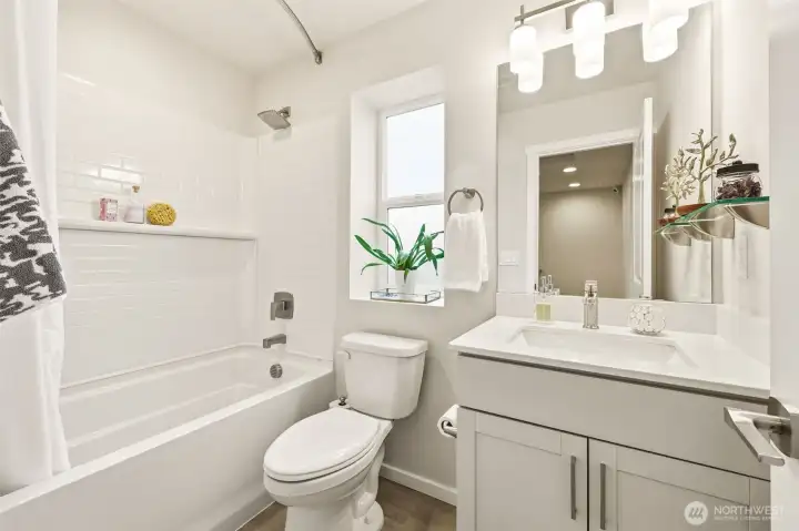 Guest bath with clean, modern finishes for convenience and style.