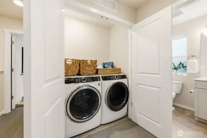 Upstairs laundry for ultimate convenience.