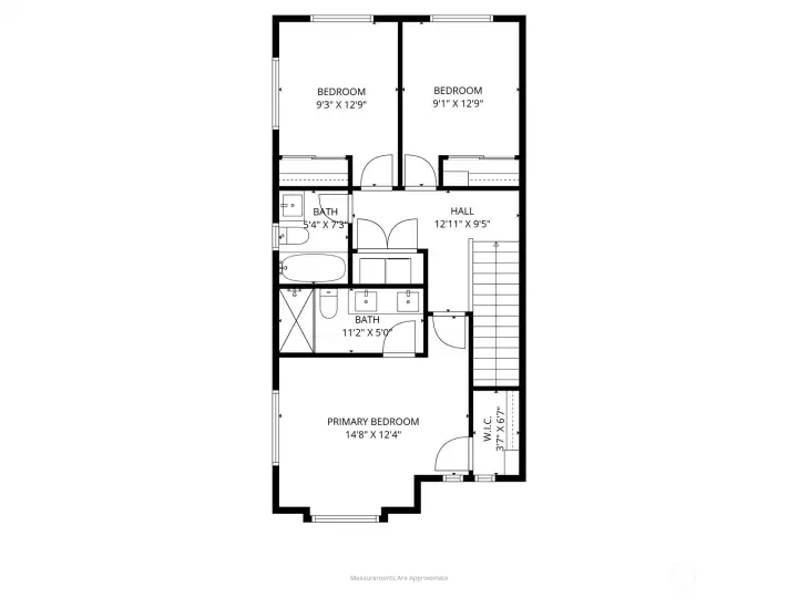 Upstairs retreat with primary suite, additional bedrooms, and convenient laundry.