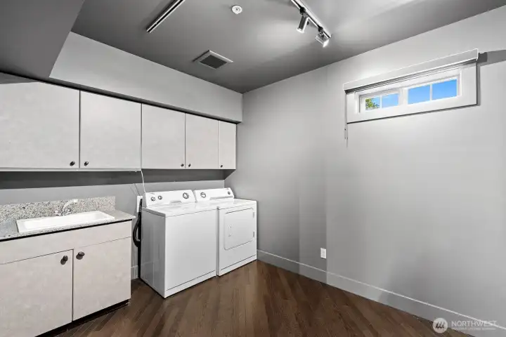 The biggest condo laundry room ever. Seller used it as a second office too.