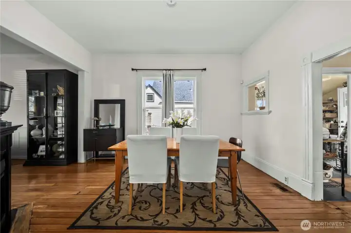 Dining room with lots of light and tall ceilings