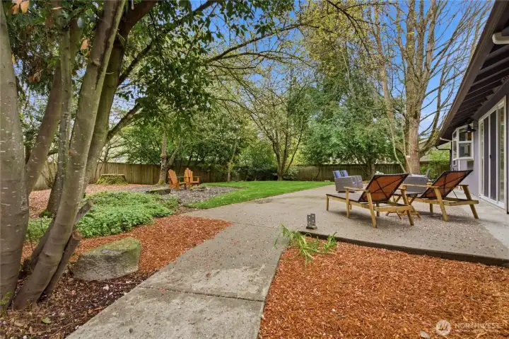 Concrete paths to gates on both sides of the home