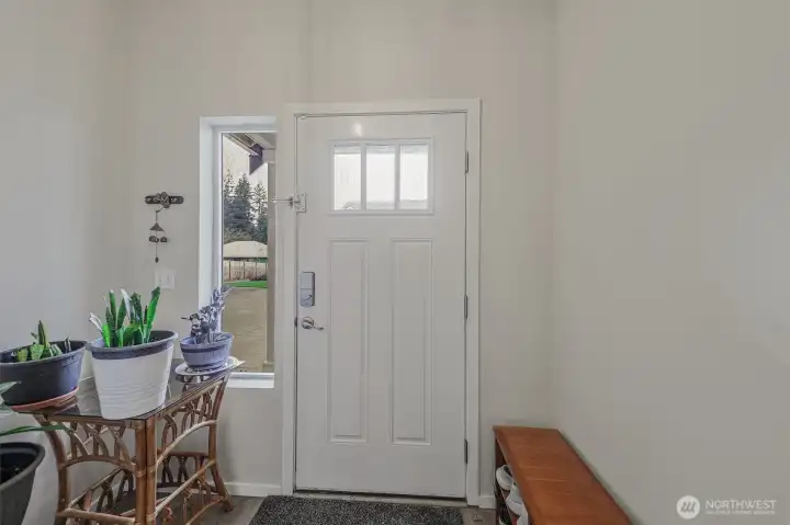 Bright and welcoming entry with natural light.