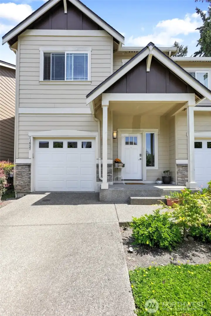 Charming craftsman style townhome. Covered porch and attached garage for extra convenience. Charming craftsman style townhome. Covered porch and attached garage for extra convenience.