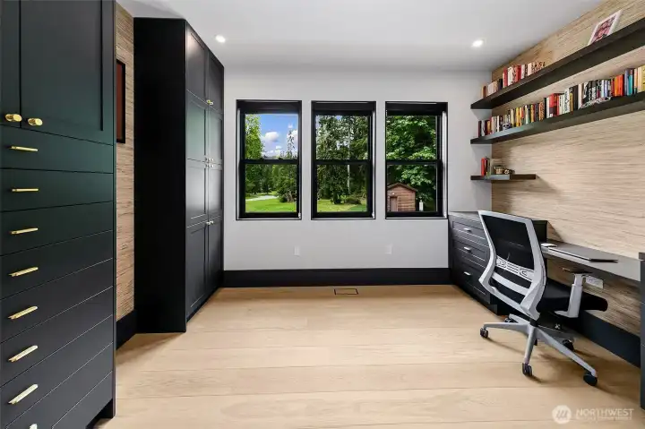 2nd office next to the powder has double carriage doors with sexy dark shaker cabinets, walnut shelving and real natural color grasscloth wallpaper. Note, the hardware is custom made. 2nd office next to the powder has double carriage doors with sexy dark shaker cabinets, walnut shelving and real natural color grasscloth wallpaper. Note, the hardware is custom made.