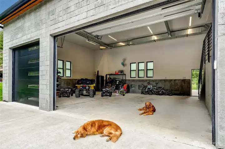 3 car garage has extra high doors; bring your big trucks here. 3 car garage has extra high doors; bring your big trucks here.