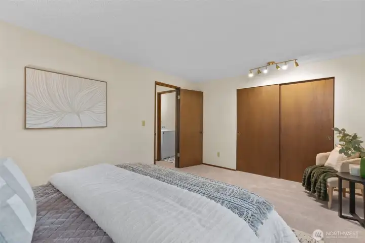 Large primary bedroom on main level offers ample closet space. Large primary bedroom on main level offers ample closet space.