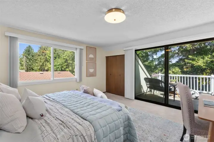 Upstairs offers a second loft style bedroom with a half bath and a sunny balcony Upstairs offers a second loft style bedroom with a half bath and a sunny balcony