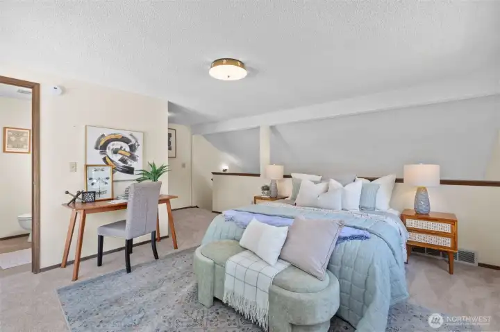 Loft style bedroom is oversized and sunny. Loft style bedroom is oversized and sunny.