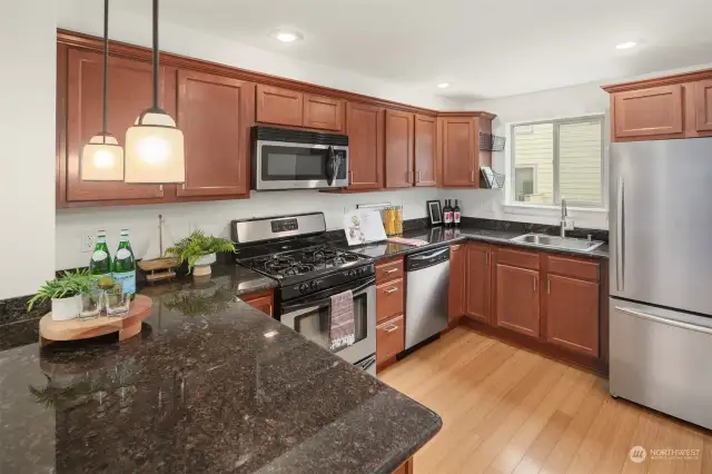 The spacious kitchen offers all stainless appliances and great counter space!