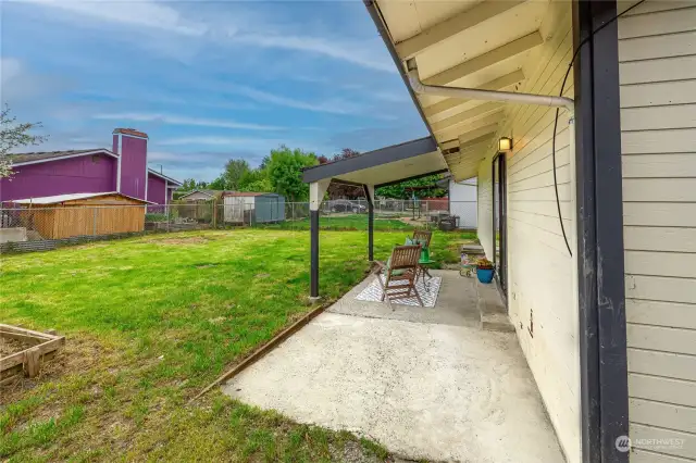 The large patio in the back has everything: shade if you want it and sun if that is what you prefer.