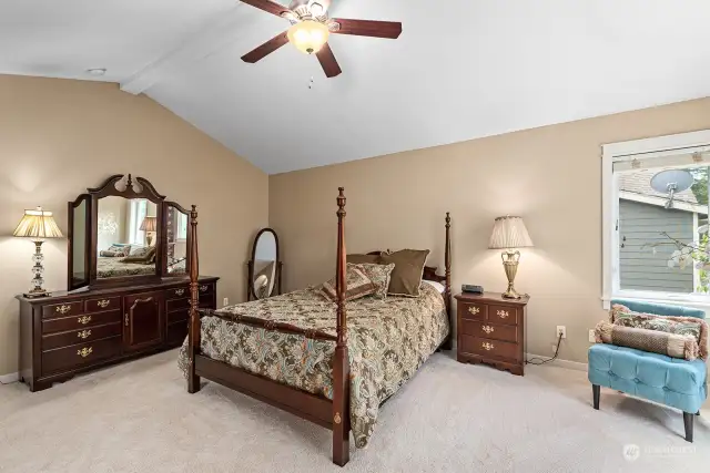 Spacious Primary bedroom with vaulted ceiling - your private retreat!