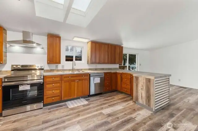 This kitchen is a chefs dream with everything from stainless appliances to quiet close drawers, pull-outs and 2 Lazy Susans!